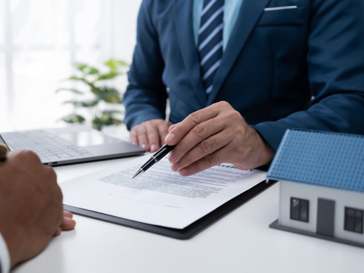 Signing house contract with agent