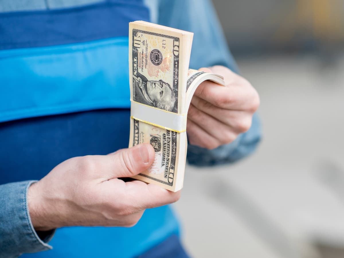 builder counting money