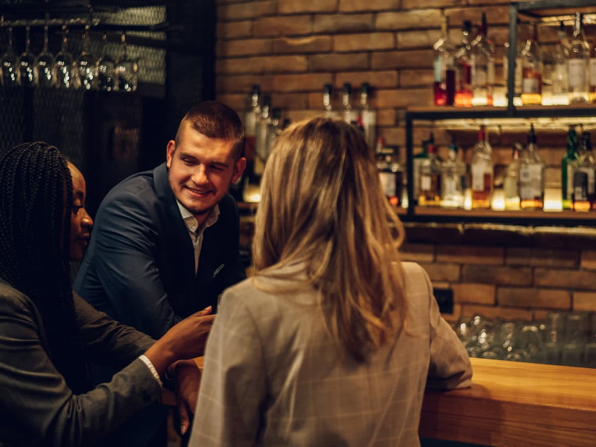 cheerful colleagues drinking beer in the bar toget 2026 03 25 05 46 51 utc (1)