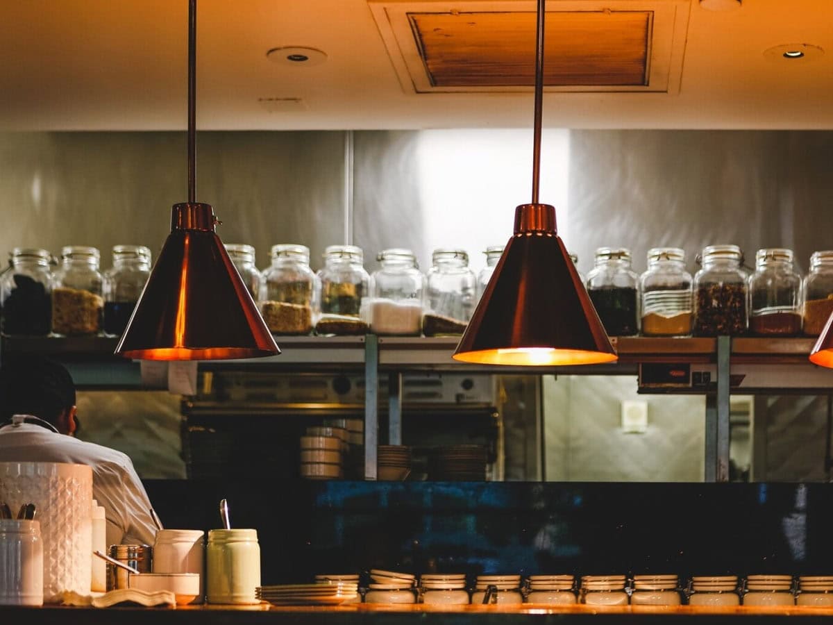 copper and iron lamps in front of the open kitchen 2026 01 07 01 39 09 utc scaled