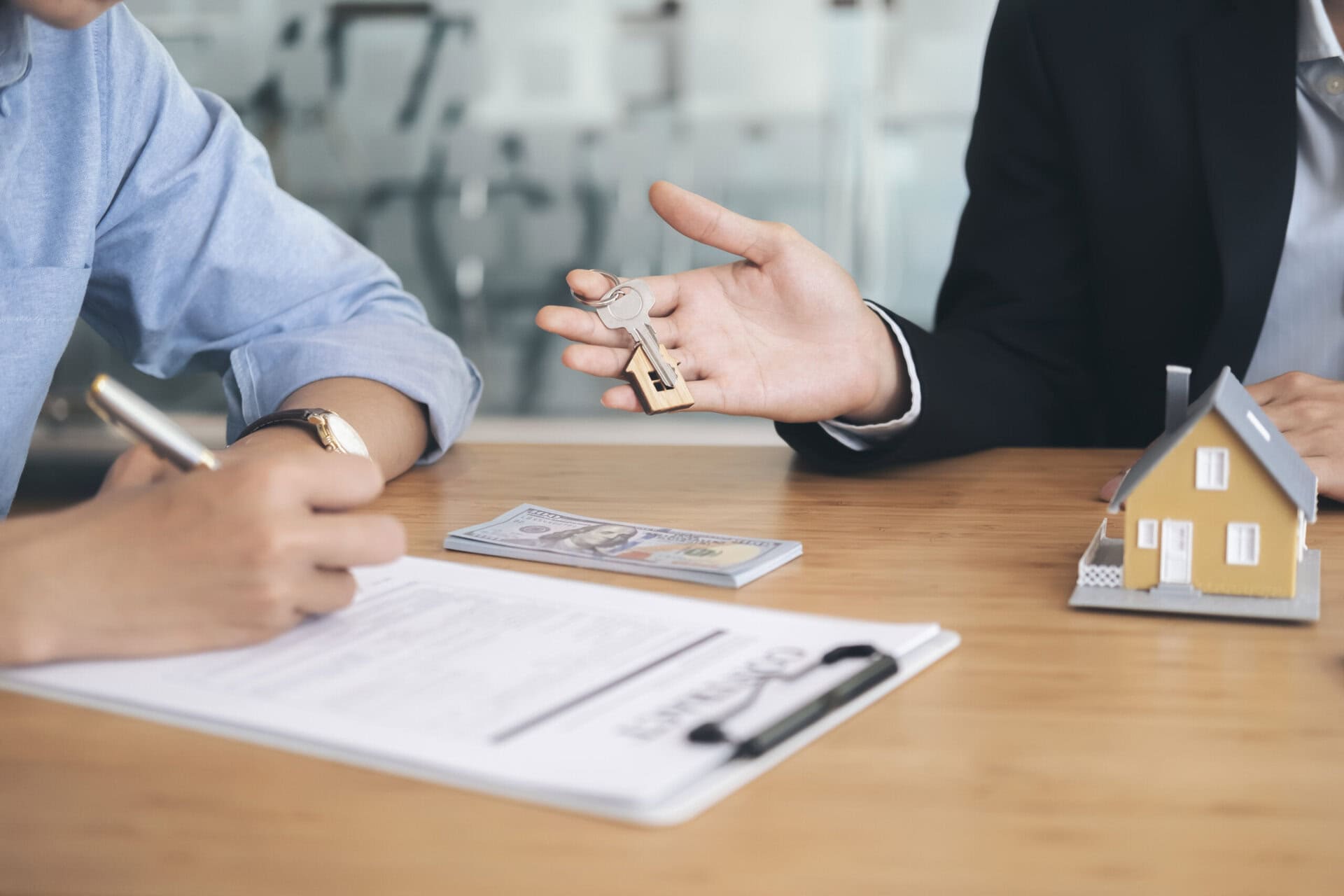 Customer signing contract for a new house. Real estate buy or rent or sale house and insurance or loan real estate.