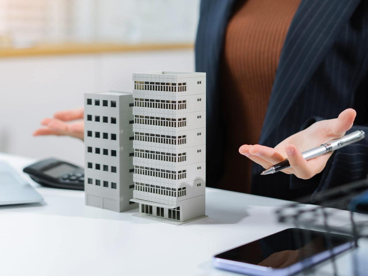 real estate developer presents building model 2026 01 09 10 55 45 utc