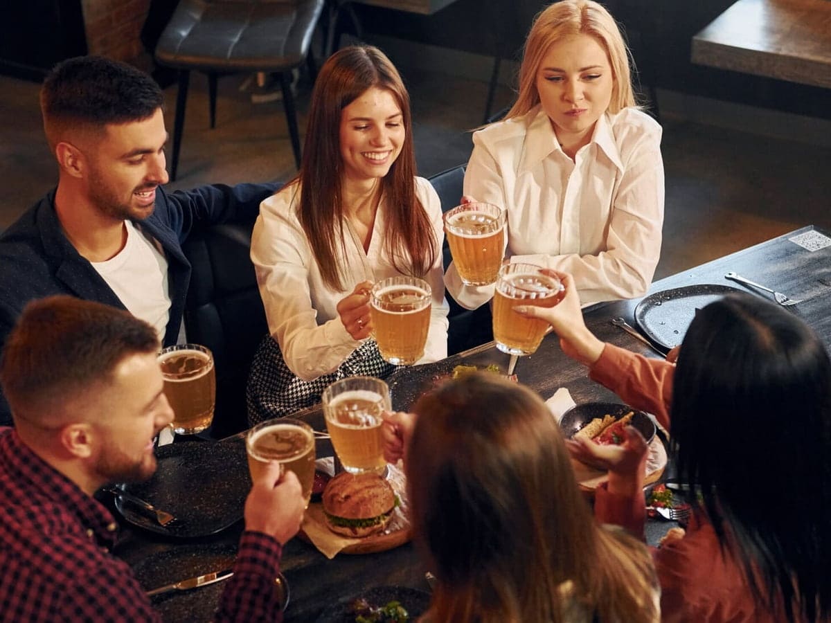 tasteful beer group of young friends sitting toge 2026 01 08 23 27 30 utc scaled